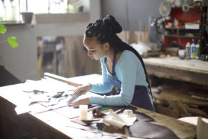 Craftswoman working in workshop