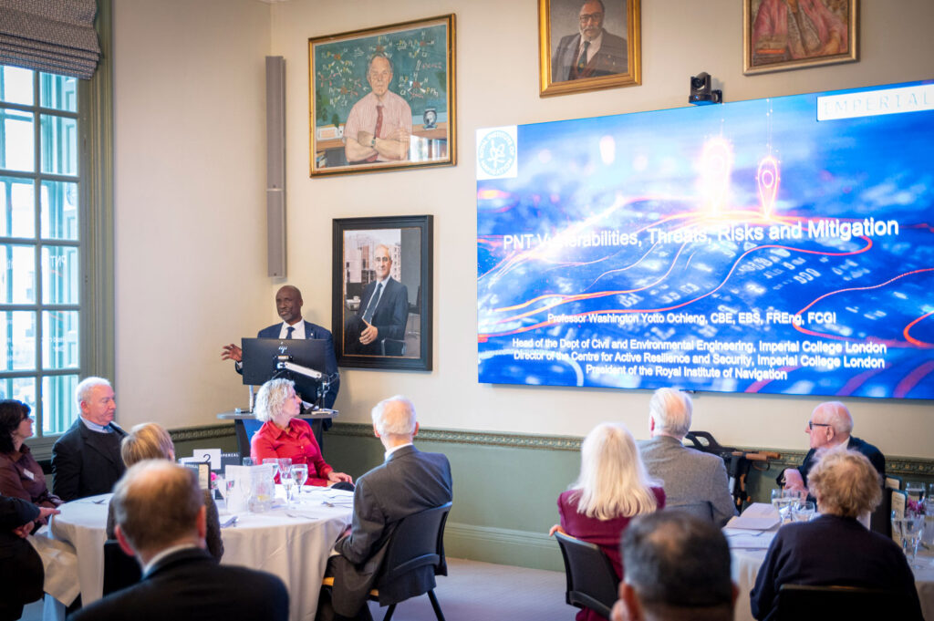 Washington Ochieng presenting to the Fellowship lecture-lunch